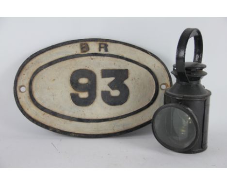 A cast iron British Rail bridge plate, No 93, 45cm; wit a B.R.(M) signal mans lamp (2)