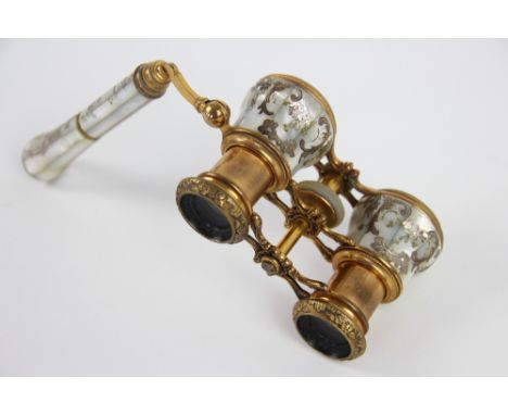 A pair of F. Khun lacquered brass and inlaid mother of pearl opera glasses, late 19th century, 11cm (a/f)