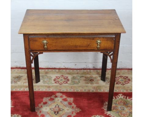 A George III oak side table, with drawer and pierced corner angles, on chamfered square legs, 70cm x 73cm x 48cm