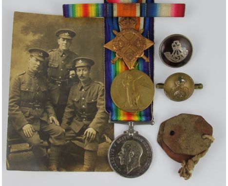 A World War I trio to 12311 Pte R.W. Evans, Shropshire Light Infantry, WM, VM and 14-15 star, with three photographic postcar