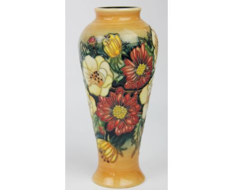 A Moorcroft Victoriana pattern vase designed by Emma Bossons, decorated with floral designs on a washed orange ground, painte