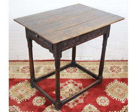 A late 17th century oak side table, with drawer on turned legs and stretcher base, (size)