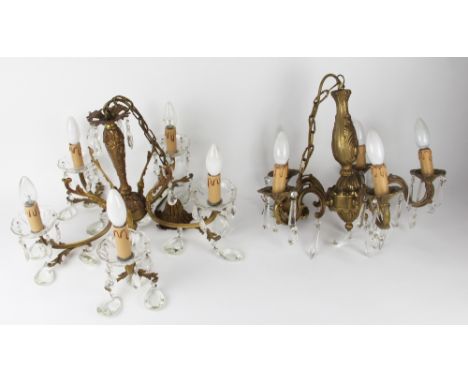 A French cast brass five branch chandelier, with glass drip pans, 45cm diameter; with a similar five branch chandelier; a thr