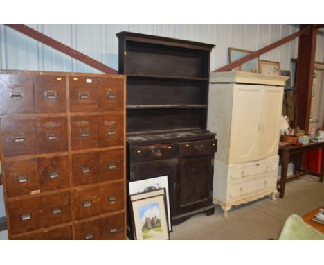 An oak dresser fitted two drawers and cupboards below 