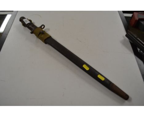 A bayonet dated 1913 with scabbard