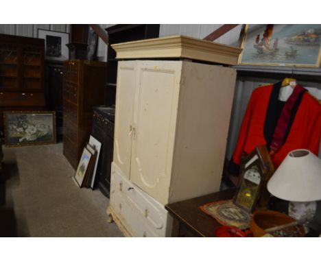 A French style painted linen cupboard fitted two drawers below