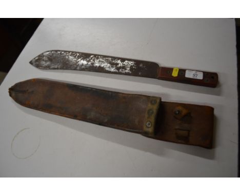 A WW2 style machete in scabbard