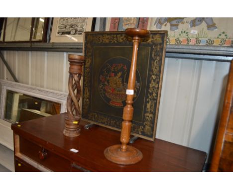 A hardwood open twist candlestick; together with an oak smokers stand; and an oriental decorated firescreen 