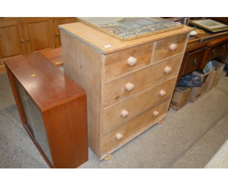 A stripped pine chest fitted two short over three long drawers 