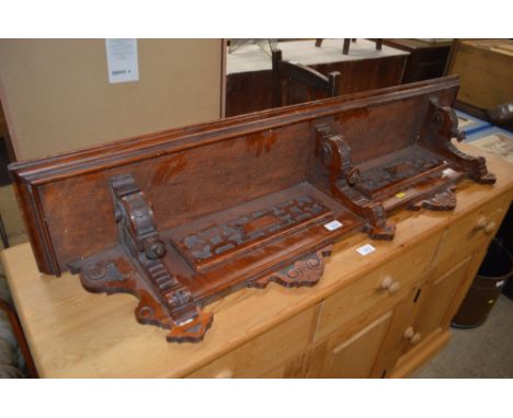 A late Victorian mahogany shelf 