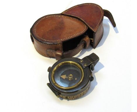 A WWI British 1917 dated field compass made by John Wardale and Co., London brown leather cased