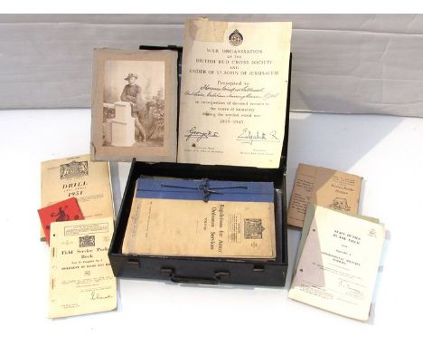 A WWII 1945 dated First Aid tin together with ephemera including Field Service Pocket Book 1943 and Ordnance Services Regulat