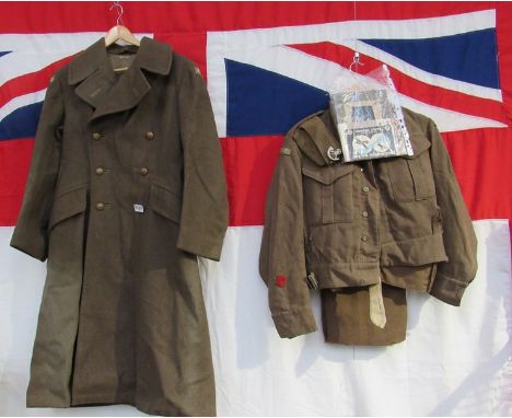 A WWII 1940 Home Guard outfit consisting of Great coat, battledress blouse and trousers, forage cap, photograph and ephemera 