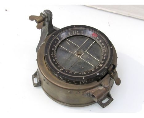 A WWII British P12 aircraft compass marked 6B/1673 with broad arrow to brass casing 