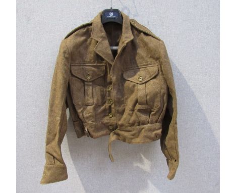 A British Army 1949 pattern Battledress blouse size 8, 1955 dated with Cambs and Hunt's ACF and insignia and another, some mo