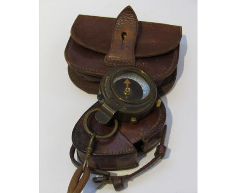 A WWI British Verner's pattern marching compass, the brown leather case marked 1918, together with a belt pouch 