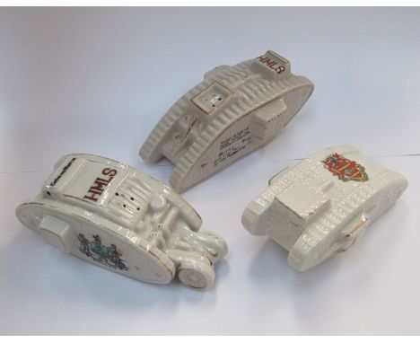 Three crested china tanks, two Carlton china, the other swan china, Sheffield, Poole and Kings Lynn crests. 'British Tank gav