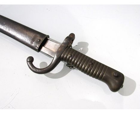 A 19th Century French Chassepot sabre bayonet with matching numbered scabbard, dated 1873