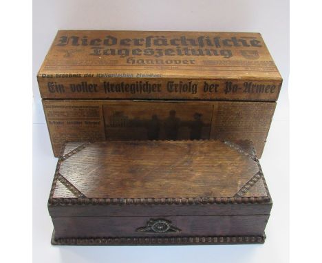A Nazi newspaper covered trinket box and an oak beaded box with artillery badge (2)