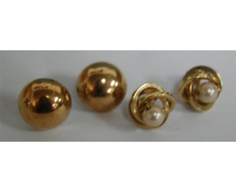 A pair of 9ct gold convex ear studs and a pair of yellow metal and pearl set ear studs (2)