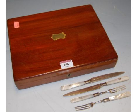A set of twelve silver and mother of pearl dessert knives and forks (one knife missing), housed in associated walnut canteen 