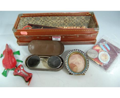 Mixed lot to include; cased pair of WWII anti-glare spectacles (a/f), tinplate model of a dragon etc 