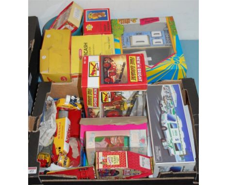 Two boxes of assorted childrens toys and games to include; boxed Newbright fire engine, Casdon Supercash cash register, loose