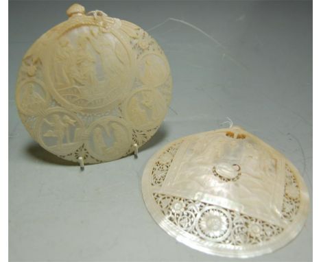 A pair of middle eastern mother-of-pearl carvings depicting biblical scenes, one entitled "Bethlehem"
