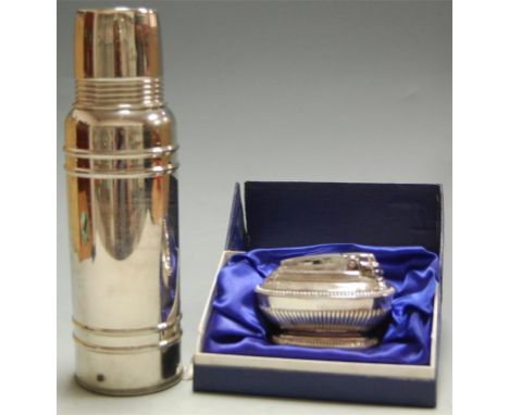 An Icy-Hot chrome flask and a cased Ronson silver plated table lighter (2)