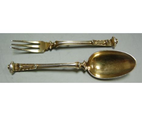 A Victorian silver gilt part childs christening set comprising fork and spoon (2)