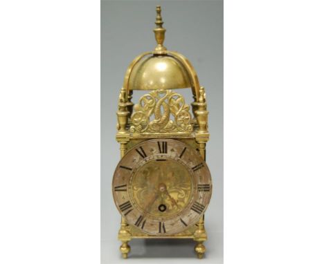 A 17th century style brass lantern clock