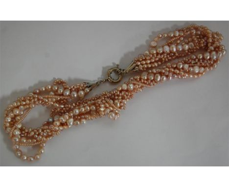 A modern multi-string pink pearl choker 