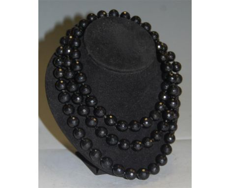 A faceted and beaded black jade necklace