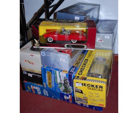 A collection of various 1/18 and other scale diecast and plastic model vehicles to include; New Ray long haulers, Road Signat