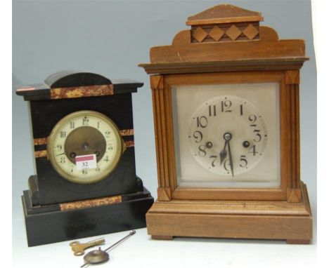 A circa 1900 slate mantel clock, and one other wooden cased mantel clock with silvered dial and striking movement (2)