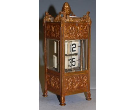 A circa 1900 continental gilt metal cased calendar clock