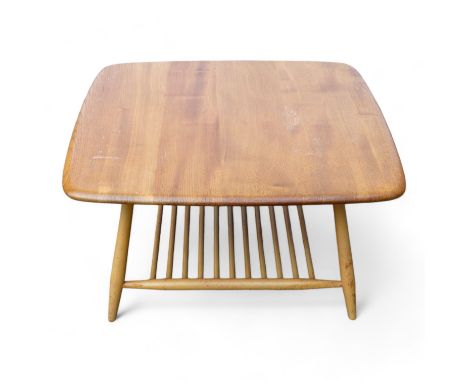 An Ercol Windsor model 767 elm square coffee table - with square top above splayed beech supports joined by a spindle underti