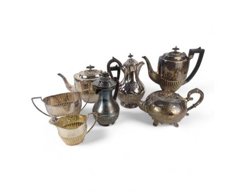 A silver plated four piece tea and coffee service - part gadrooned and with ebonised fittings, together with two associated h