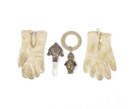 A silver rattle - Birmingham 1900, with a mother-of-pearl teether and bells, together with another silver teether and a pair 