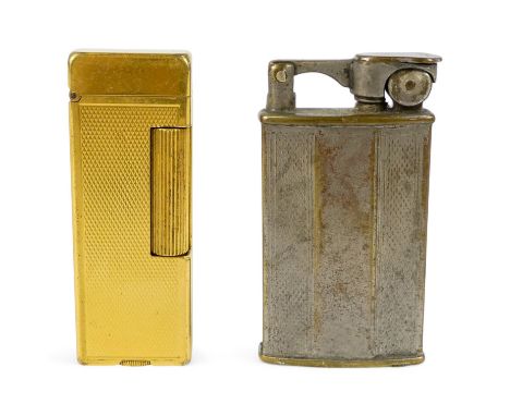 A Dunhill gold plated cigarette lighter - of rectangular form and decorated with engine turning, together with another lighte
