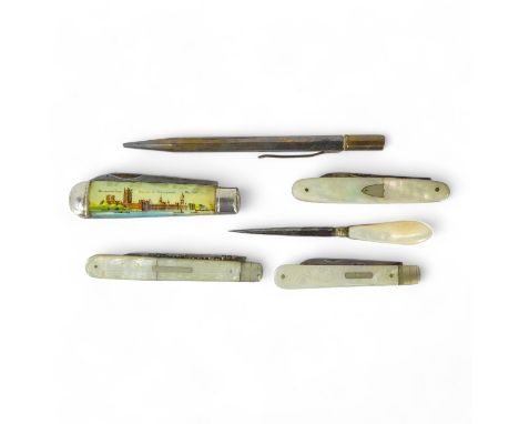 An early 20th century silver and mother-of-pearl fruit knife - the folding blade within an engraved handle, together with thr