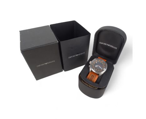 An Emporio Armani gentlemans wristwatch - steel case, black dial and orange numerals and strap, boxed with papers.