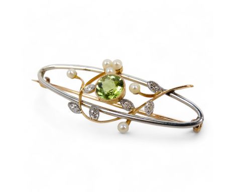 A 9ct gold peridot and pearl brooch - of open oval form in the form of flowers, 3.8g together with a garnet set ring of navet