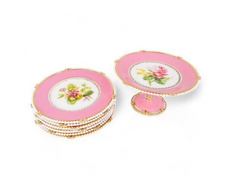 A 19th century Ridgway dessert service - comprising a comport and six plates, pink and decorated with roses.