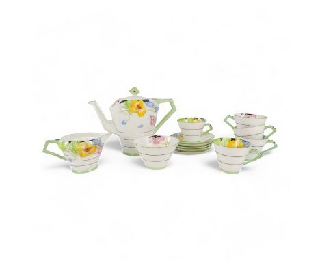 A Paragon coffee service - in the Art Deco style, decorated with flowers, comprising a coffee pot, a milk jug, a sucrier and 