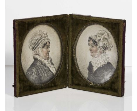 A Georgian double portrait  miniatures of oval shape, fitted  in a red morocco leather case, executed in pencil and coloured 