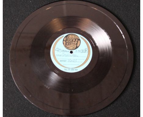PAUL MCCARTNEY & WINGS - acetate recording of Girls School which was the B-side of Mull of Kintyre. 7" recording on a 10" dis