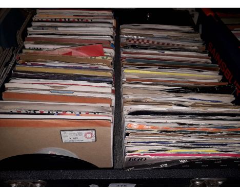 A box of singles - over 350 records from various genres and artistes including Danny Williams, Colin Blunstone, Dave Edmunds,