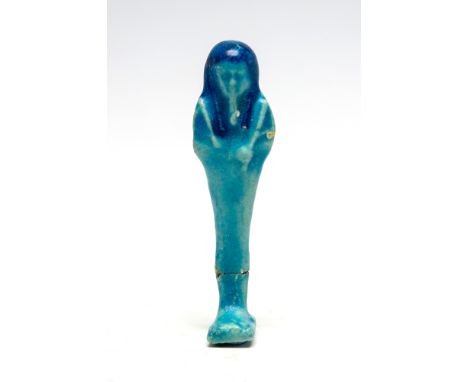 Egyptian Ptolemaic Period Faience ShabtiPtolemaic Period, 4th Century BC.A bright blue faience mummiform ushabtis, wearing a 