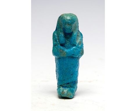 Provenanced Egyptian faience shabti figure22nd Dynasty, C. 943 BC - 713 BC. A well provenanced Egyptian blue glazed faience s
